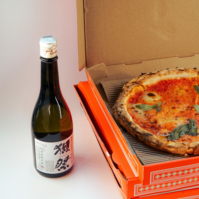 A Margherita Fior Di Latte Pizza & 1 Bottle of Sake
